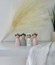 Load image into Gallery viewer, Personalised peg dolls, Personalised wooden dolls, new baby gift, nursery name sign, wooden letter floral nursery decor shelf accessories.wooden peg dolls