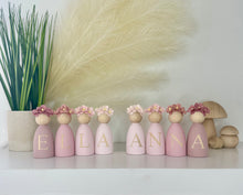 Load image into Gallery viewer, Personalised Daisy dolls peg dolls, Personalised wooden dolls, new baby gift, nursery name sign, wooden letter floral nursery decor shelf accessories.wooden peg dolls