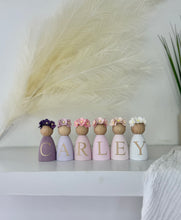 Load image into Gallery viewer, Personalised Daisy dolls peg dolls, Personalised wooden dolls, new baby gift, nursery name sign, wooden letter floral nursery decor shelf accessories.wooden peg dolls