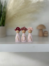 Load image into Gallery viewer, Personalised Daisy dolls peg dolls, Personalised wooden dolls, new baby gift, nursery name sign, wooden letter floral nursery decor shelf accessories.wooden peg dolls